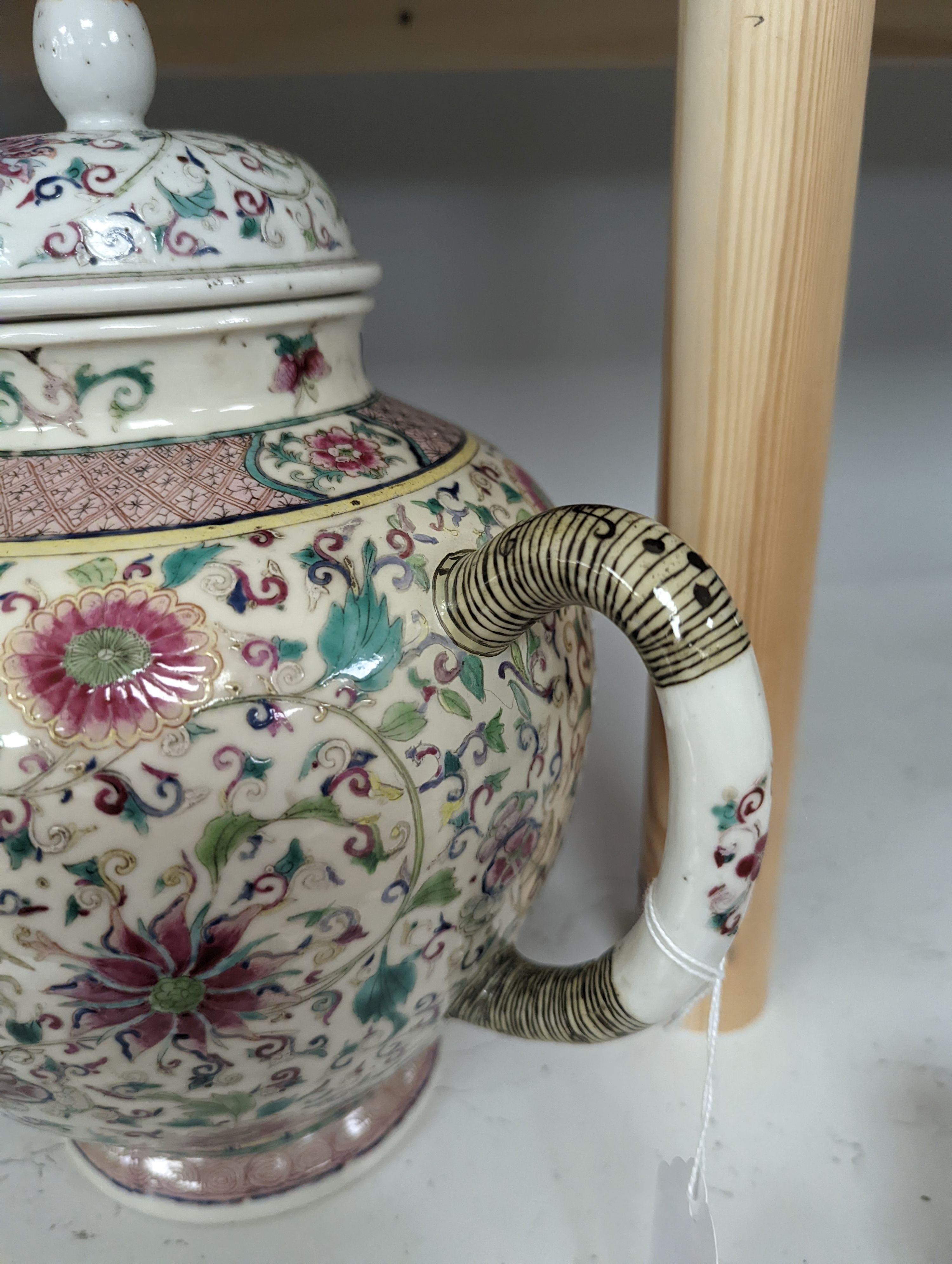 A large 19th century Chinese famille rose wine pot, and another wine pot, tallest 27cm